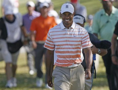Tiger Woods of the U.S. walks to the 11th tee following a birdie during second round play in the 2013 WGC-Cadillac Championship in Doral, Fl Tiger Woods of the U.S. walks to the 11th tee following a birdie during second round play in the 2013 WGC-Cadillac Championship in Doral, Fl