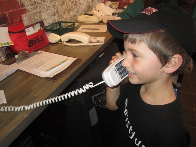 St Jude patient Liam helped with answering phones.