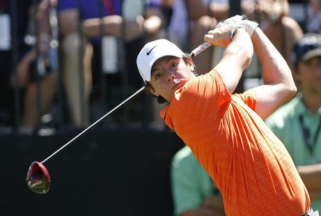 Northern Ireland's Rory McIlroy tees off on the first hole during second round play in the 2013 WGC-Cadillac Championship PGA golf tournamen Northern Ireland's Rory McIlroy tees off on the first hole during second round play in the 2013 WGC-Cadillac Championship PGA golf tournamen