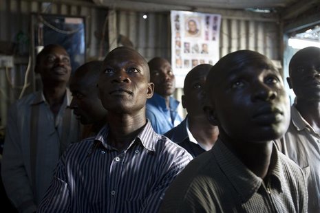 Supporters of Kenyan Prime Minister Raila Odinga watch election results on television in the Mathare slum in the Kenyan capital of Nairobi, Supporters of Kenyan Prime Minister Raila Odinga watch election results on television in the Mathare slum in the Kenyan capital of Nairobi,