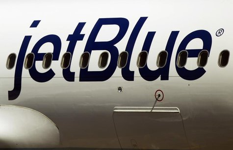 A JetBlue Airways plane awaits take off while at LaGuardia Airport in New York April 5, 2012. JETBLUE/ REUTERS/Lucas Jackson A JetBlue Airways plane awaits take off while at LaGuardia Airport in New York April 5, 2012. JETBLUE/ REUTERS/Lucas Jackson