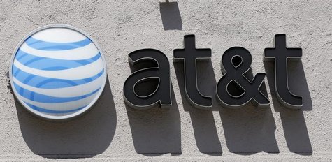 An At&T logo is seen atop a store in Beverly Hills, California August 31, 2011. REUTERS/Danny Moloshok