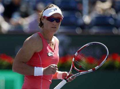 Samantha Stosur of Australia celebrates winning a point against Madison Keys of the U.S. during their match at the BNP Paribas Open WTA tenn Samantha Stosur of Australia celebrates winning a point against Madison Keys of the U.S. during their match at the BNP Paribas Open WTA tenn
