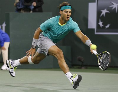 Rafael Nadal of Spain hits a return against Ryan Harrison of the U.S. during their match at the BNP Paribas Open ATP tennis tournament in In Rafael Nadal of Spain hits a return against Ryan Harrison of the U.S. during their match at the BNP Paribas Open ATP tennis tournament in In