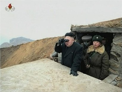 North Korean leader Kim Jong-un looks through a pair of binoculars at an undisclosed location, in this still image taken from video shown by North Korean leader Kim Jong-un looks through a pair of binoculars at an undisclosed location, in this still image taken from video shown by
