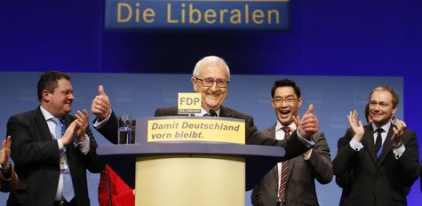 Faction leader of the liberal Free Democratic Party (FDP) Rainer Bruederle (C) reacts after his speech during a two-day party convention in Faction leader of the liberal Free Democratic Party (FDP) Rainer Bruederle (C) reacts after his speech during a two-day party convention in