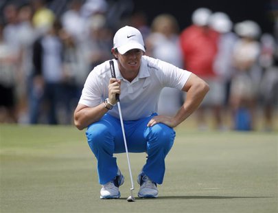Northern Ireland's Rory McIlroy looks at his putt on the ninth green during the third round of play in the 2013 WGC-Cadillac Championship PG Northern Ireland's Rory McIlroy looks at his putt on the ninth green during the third round of play in the 2013 WGC-Cadillac Championship PG