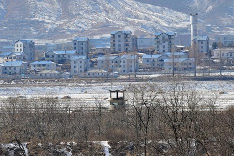 A North Korean guard post (C) in the propaganda village of Gijeongdong is seen from South Korea's Taesungdong freedom village, near the bord A North Korean guard post (C) in the propaganda village of Gijeongdong is seen from South Korea's Taesungdong freedom village, near the bord