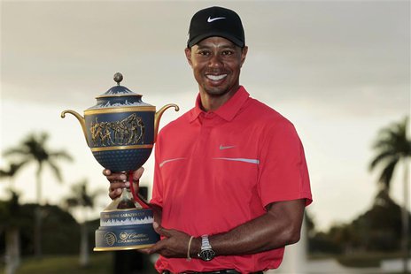 Tiger Woods poses with the Gene Sarazen Trophy after winning the 2013 WGC-Cadillac Championship PGA golf tournament in Doral, Florida March Tiger Woods poses with the Gene Sarazen Trophy after winning the 2013 WGC-Cadillac Championship PGA golf tournament in Doral, Florida March
