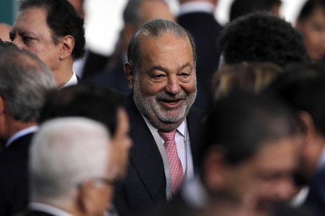 Mexican businessman Carlos Slim attends as an official guest the speech of Mexico's new President Enrique Pena Nieto at the National Palace Mexican businessman Carlos Slim attends as an official guest the speech of Mexico's new President Enrique Pena Nieto at the National Palace