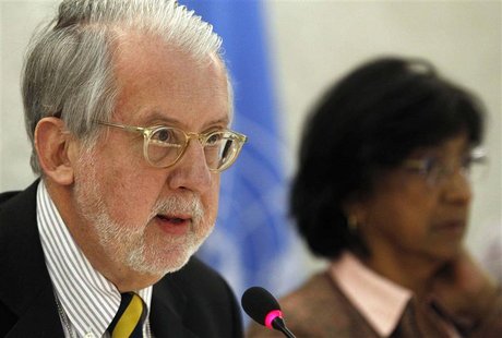 Chair of the Commission of Inquiry on Syria Paulo Pinheiro (L) delivers his report next to U.N. human rights chief Navi Pillay during the Hu Chair of the Commission of Inquiry on Syria Paulo Pinheiro (L) delivers his report next to U.N. human rights chief Navi Pillay during the Hu