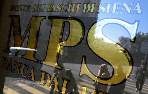 People are reflected in the window of a Monte Dei Paschi Di Siena bank in Rome January 29, 2013. REUTERS/Max Rossi People are reflected in the window of a Monte Dei Paschi Di Siena bank in Rome January 29, 2013. REUTERS/Max Rossi