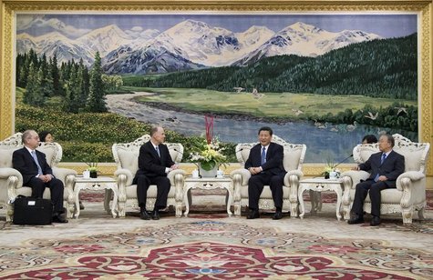 U.S. National Security Advisor Tom Donilon (center L) talks with China's Vice President Xi Jinping (center R) during a meeting at the Great U.S. National Security Advisor Tom Donilon (center L) talks with China's Vice President Xi Jinping (center R) during a meeting at the Great