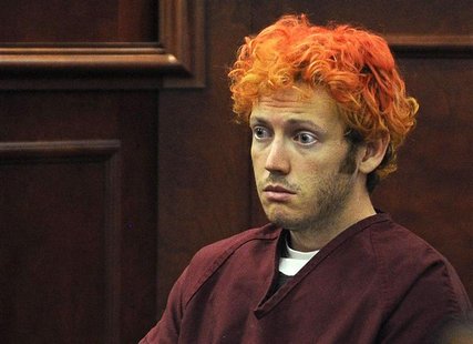 Colorado shooting suspect James Eagan Holmes (L) sits with public defender Tamara Brady during his first court appearance in Aurora, Colorad Colorado shooting suspect James Eagan Holmes (L) sits with public defender Tamara Brady during his first court appearance in Aurora, Colorad