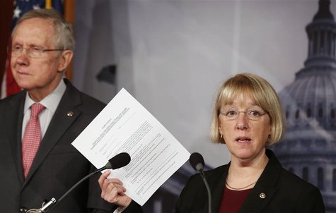 Senate Budget Committee chair Senator Patty Murray holds up a copy of a federal employees' Worker Adjustment and Retraining Notification (WA Senate Budget Committee chair Senator Patty Murray holds up a copy of a federal employees' Worker Adjustment and Retraining Notification (WA