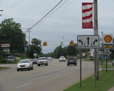 A VANISHING IMAGE? Traffic on Blue Star Highway at Wiley Road in Douglas. City planners are hoping to replace the traffic signal with a roundabout. (photo courtesy City of the Village of Douglas) A VANISHING IMAGE? Traffic on Blue Star Highway at Wiley Road in Douglas. City planners are hoping to replace the traffic signal with a roundabout. (photo courtesy City of the Village of Douglas)