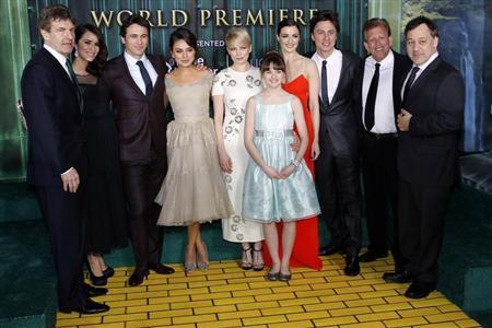 From L-R) Walt Disney Studios Chairman Alan Horn, actress Abigail Spencer, actor James Franco, actresses Mila Kunis, Michelle Williams, Joey King, Rachel Weisz, actor Zach Braff, producer Joe Roth and director Sam Raimi pose for a picture at the premiere of the Disney movie ''Oz the Great and Powerful'' at the El Capitan Theatre in Hollywood, California February 13, 2013.
Credit: Reuters/Patrick Fallon From L-R) Walt Disney Studios Chairman Alan Horn, actress Abigail Spencer, actor James Franco, actresses Mila Kunis, Michelle Williams, Joey King, Rachel Weisz, actor Zach Braff, producer Joe Roth and director Sam Raimi pose for a picture at the premiere of the Disney movie ''Oz the Great and Powerful'' at the El Capitan Theatre in Hollywood, California February 13, 2013.
Credit: Reuters/Patrick Fallon