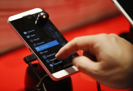 A person uses the new Blackberry Z10 device at a Rogers store in Toronto February 5, 2013. Tuesday marks the first day the Blackberry Z10 wi A person uses the new Blackberry Z10 device at a Rogers store in Toronto February 5, 2013. Tuesday marks the first day the Blackberry Z10 wi