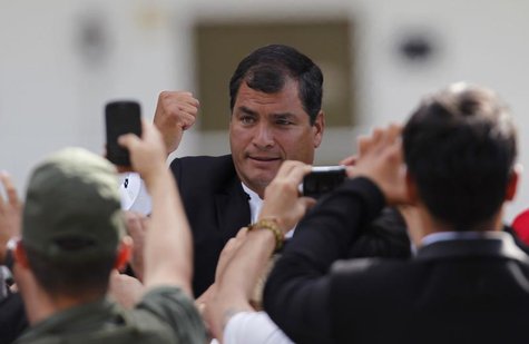 Ecuador's President Rafael Correa leaves the funeral ceremony for Venezuela's late President Hugo Chavez, at the Military Academy in Caracas Ecuador's President Rafael Correa leaves the funeral ceremony for Venezuela's late President Hugo Chavez, at the Military Academy in Caracas
