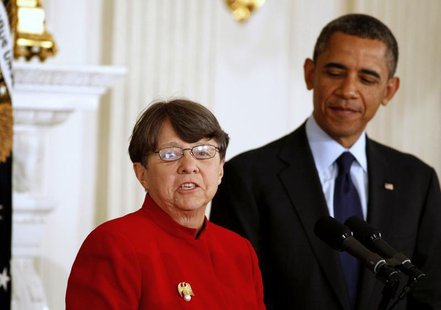 U.S. President Barack Obama (R) stands next to Mary Jo White, a former United States attorney, after he announces her to be the next chairwo U.S. President Barack Obama (R) stands next to Mary Jo White, a former United States attorney, after he announces her to be the next chairwo