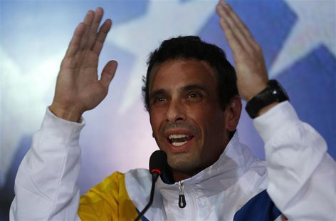 Venezuela's opposition leader and presidential candidate Henrique Capriles gestures during a news conference in Caracas March 11, 2013. REUT Venezuela's opposition leader and presidential candidate Henrique Capriles gestures during a news conference in Caracas March 11, 2013. REUT