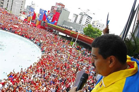 Venezuela's acting President, Nicolas Maduro, gestures to supporters after he registered as a candidate for president in the April 14th elec Venezuela's acting President, Nicolas Maduro, gestures to supporters after he registered as a candidate for president in the April 14th elec