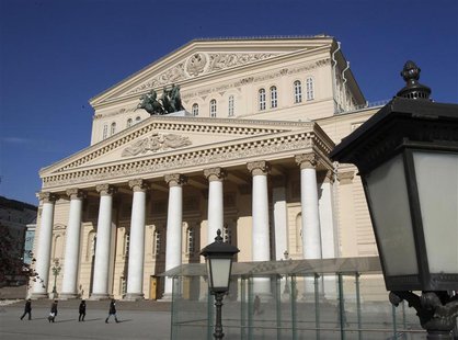People walk past the main entrance to the Bolshoi Theatre in Moscow March 12, 2013. REUTERS/Sergei Karpukhin People walk past the main entrance to the Bolshoi Theatre in Moscow March 12, 2013. REUTERS/Sergei Karpukhin