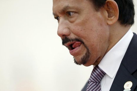 Brunei's Sultan Hassanal Bolkiah leaves the Plenary session of the 21st ASEAN (Association of Southeast Asian Nations) and East Asia summits Brunei's Sultan Hassanal Bolkiah leaves the Plenary session of the 21st ASEAN (Association of Southeast Asian Nations) and East Asia summits