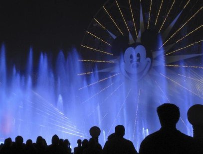 People watch the "World of Color" show at Disneyland in Anaheim, California, March 11, 2011. REUTERS/Mike Blake People watch the "World of Color" show at Disneyland in Anaheim, California, March 11, 2011. REUTERS/Mike Blake