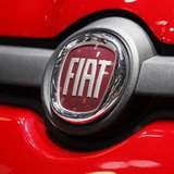 The Fiat logo is seen in a car displayed on the Fiat booth during the first media day of the Geneva Auto Show at the Palexpo in Geneva March