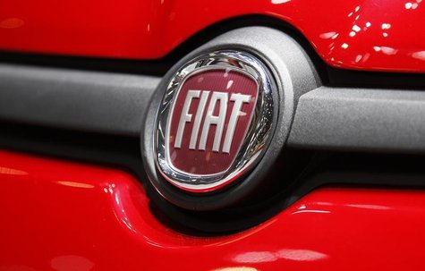 The Fiat logo is seen in a car displayed on the Fiat booth during the first media day of the Geneva Auto Show at the Palexpo in Geneva March The Fiat logo is seen in a car displayed on the Fiat booth during the first media day of the Geneva Auto Show at the Palexpo in Geneva March