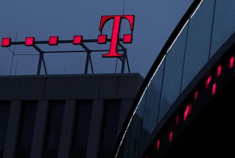 The logo of Deutsche Telekom AG is pictured at their headquarters, in this file photo taken in Bonn December 5, 2012. REUTERS/Ina Fassbender The logo of Deutsche Telekom AG is pictured at their headquarters, in this file photo taken in Bonn December 5, 2012. REUTERS/Ina Fassbender