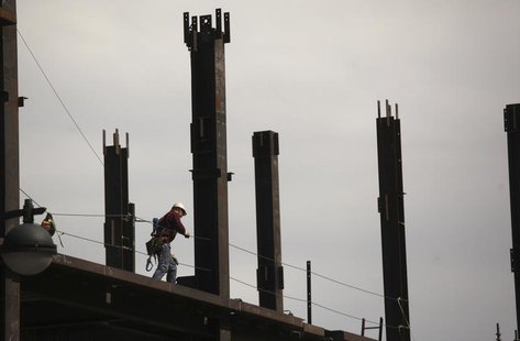 A construction worker performs labor at a residential building project in the China Basin area in San Francisco, California March 8, 2013. R A construction worker performs labor at a residential building project in the China Basin area in San Francisco, California March 8, 2013. R