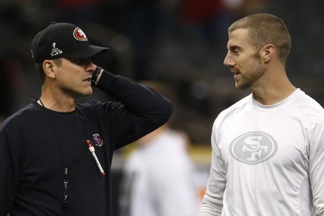 San Francisco 49ers head coach Jim Harbaugh (L) talks with quarterback Alex Smith during warm ups ahead of the NFL Super Bowl XLVII football San Francisco 49ers head coach Jim Harbaugh (L) talks with quarterback Alex Smith during warm ups ahead of the NFL Super Bowl XLVII football