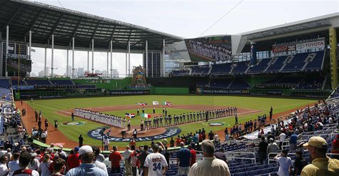 Players from Dominican Republic (L) and Italy (R) line up before their 2013 World Baseball Classic game at Marlins Stadium in Miami, Florida Players from Dominican Republic (L) and Italy (R) line up before their 2013 World Baseball Classic game at Marlins Stadium in Miami, Florida