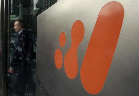 A man walks out of the head office of BHP Billiton in central Melbourne August 18, 2010. REUTERS/Mick Tsikas A man walks out of the head office of BHP Billiton in central Melbourne August 18, 2010. REUTERS/Mick Tsikas
