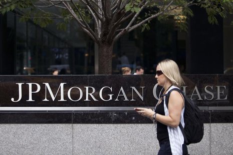 A woman walks past JP Morgan Chase's international headquarters on Park Avenue in New York July 13, 2012. REUTERS/Andrew Burton A woman walks past JP Morgan Chase's international headquarters on Park Avenue in New York July 13, 2012. REUTERS/Andrew Burton