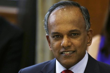 Singapore Foreign Minister K. Shanmugam poses for photos before a dinner with U.S. Secretary of State Hillary Clinton at the Ministry of For Singapore Foreign Minister K. Shanmugam poses for photos before a dinner with U.S. Secretary of State Hillary Clinton at the Ministry of For
