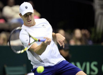 Sam Querrey of the U.S. hits a return to Brazil's Thiago Alves during their Davis Cup world group first round tennis match in Jacksonville, Sam Querrey of the U.S. hits a return to Brazil's Thiago Alves during their Davis Cup world group first round tennis match in Jacksonville,