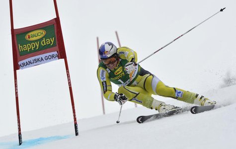 Aksel Lund Svindal of Norway clears a gate during his first run of the men's Giant Slalom event at the Alpine Skiing World Cup in Kranjska G Aksel Lund Svindal of Norway clears a gate during his first run of the men's Giant Slalom event at the Alpine Skiing World Cup in Kranjska G