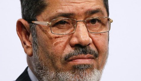 Egypt's President Mohamed Mursi gives a speech at the Koerber foundation for social challenge in Berlin January 30, 2013. REUTERS/Fabrizio B Egypt's President Mohamed Mursi gives a speech at the Koerber foundation for social challenge in Berlin January 30, 2013. REUTERS/Fabrizio B
