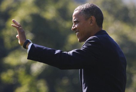President Barack Obama waves to a tour group as he departs for campaign events in Virginia from the White House in Washington September 21, President Barack Obama waves to a tour group as he departs for campaign events in Virginia from the White House in Washington September 21,