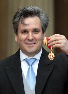 Royal Opera House Music Director, Antonio Pappano, poses with his Knighthood after being knighted by Britain's Prince Charles at Buckingham Royal Opera House Music Director, Antonio Pappano, poses with his Knighthood after being knighted by Britain's Prince Charles at Buckingham