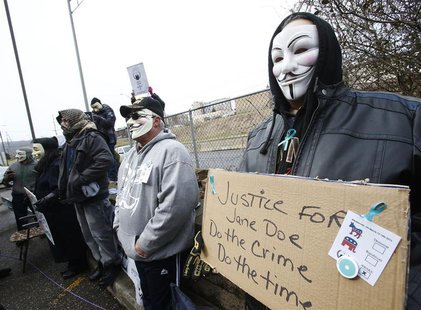 A small group of people take part in a protest outside the Juvenile Court building in Steubenville, Ohio, March 13, 2013. REUTERS/Jason Cohn A small group of people take part in a protest outside the Juvenile Court building in Steubenville, Ohio, March 13, 2013. REUTERS/Jason Cohn