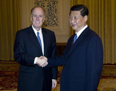 National Security Advisor Tom Donilon (L) shakes hands with China's Vice President Xi Jinping before a meeting at the Great Hall of the Peop National Security Advisor Tom Donilon (L) shakes hands with China's Vice President Xi Jinping before a meeting at the Great Hall of the Peop