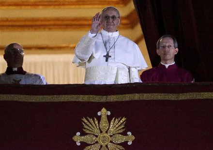 Newly elected Pope Francis, Cardinal Jorge Mario Bergoglio of Argentina appears on the balcony of St. Peter's Basilica after being elected b Newly elected Pope Francis, Cardinal Jorge Mario Bergoglio of Argentina appears on the balcony of St. Peter's Basilica after being elected b
