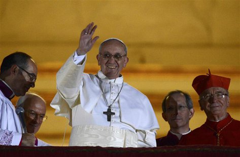 Newly elected Pope Francis, Cardinal Jorge Mario Bergoglio of Argentina appears on the balcony of St. Peter's Basilica after being elected b Newly elected Pope Francis, Cardinal Jorge Mario Bergoglio of Argentina appears on the balcony of St. Peter's Basilica after being elected b