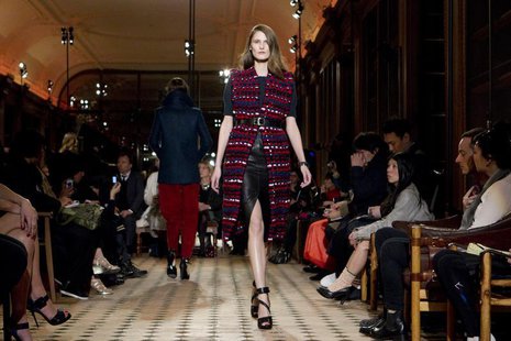 A model presents a creation by French designer Christophe Lemaire as part of his Fall-Winter 2013/2014 women's ready-to-wear collection for A model presents a creation by French designer Christophe Lemaire as part of his Fall-Winter 2013/2014 women's ready-to-wear collection for