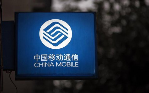 A sign with the logo of China Mobile at a downtown area of Shanghai October 22, 2012. REUTERS/Carlos Barria A sign with the logo of China Mobile at a downtown area of Shanghai October 22, 2012. REUTERS/Carlos Barria