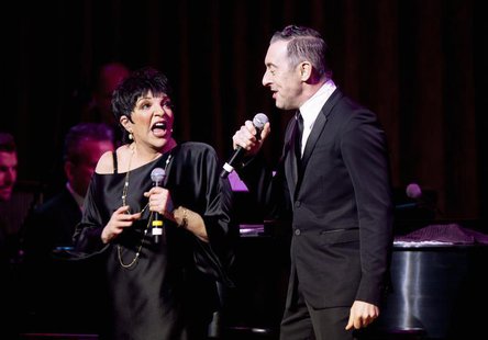 Singer Liza Minnelli and actor Alan Cumming perform during their one night only performance in New York, March 13, 2013. REUTERS/Carlo Alleg Singer Liza Minnelli and actor Alan Cumming perform during their one night only performance in New York, March 13, 2013. REUTERS/Carlo Alleg